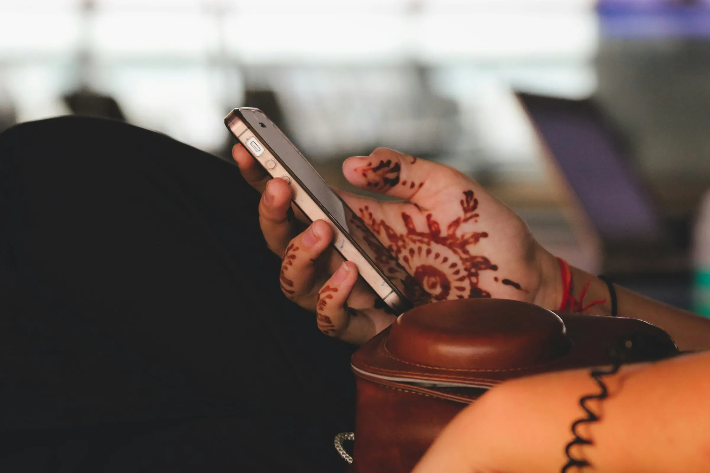 A visitor using a smartphone to take part in an interactive campaign