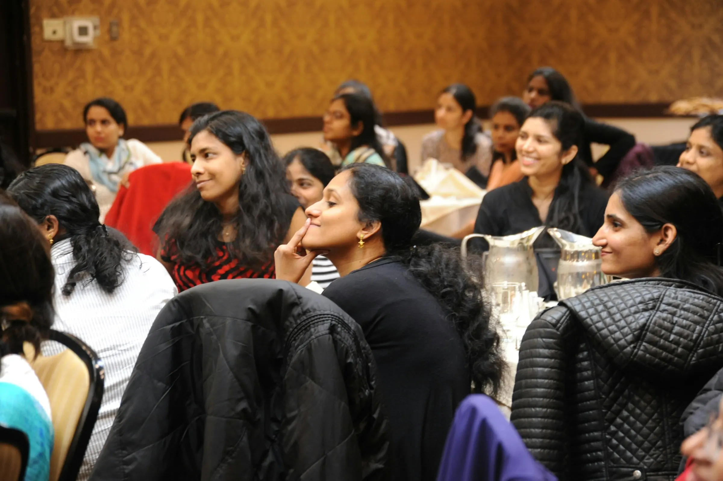 Participants working together in a design thinking workshop